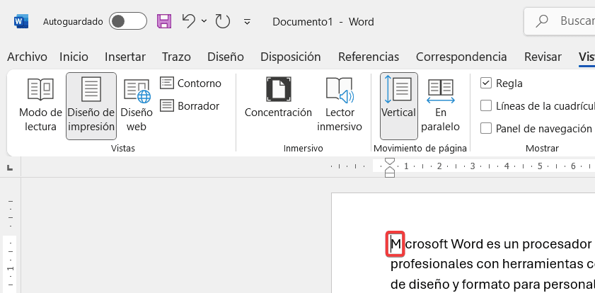 Cursor situado antes de una letra capitular "M" en un documento de Word.